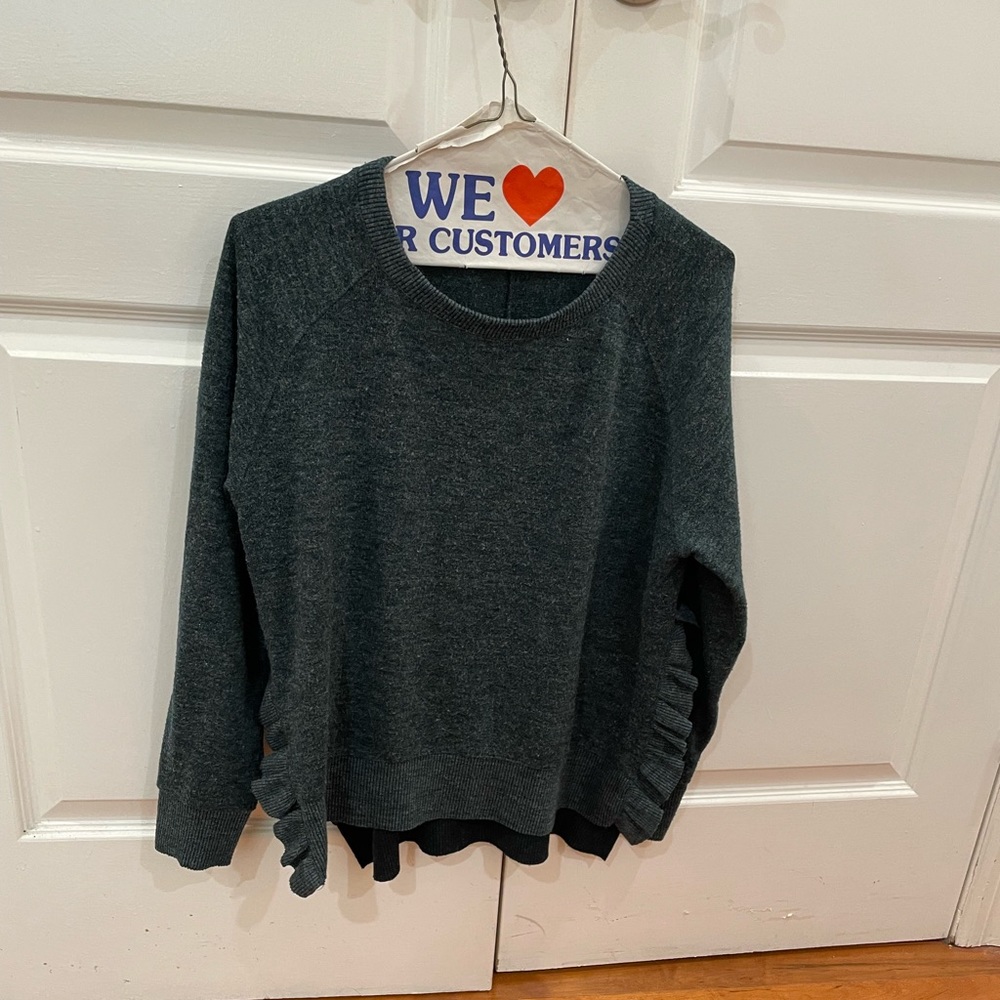 green sweater